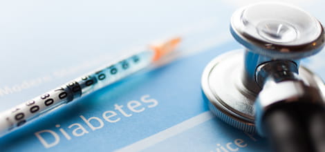 Stethoscope and a syringe